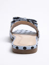 Back heel view of ZAYRA powder blue polka dot flat slippers showing open heel base