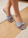 ZAYRA women's powder blue polka dot bow slippers worn on feet in a indoor setting