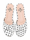 Top view pair of ZAYRA white polka dot slippers showing cushioned insole with logo